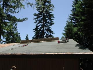 Starting to close up the roof after letting it dry out for a half a day